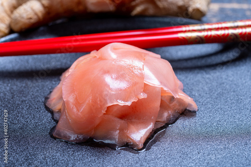 Asian food, pink sliced pickled ginger roots ready to eat