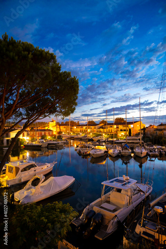 Travel and vacation destination, night view on houses, roofs, canals and boats in Port Grimaud, Var, Provence, French Riviera, France