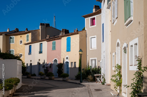 Fototapeta Naklejka Na Ścianę i Meble -  Travel and vacation destination, view on houses, roofs, canals and boats in Port Grimaud, Var, Provence, French Riviera, France