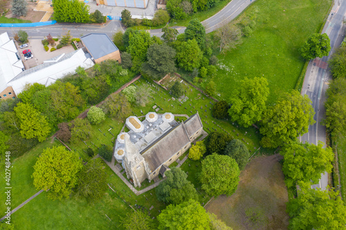 Aerial photo of an old church and church yard known as Heslington Church in the summer time in the town of York in West Yorkshire in the UK photo