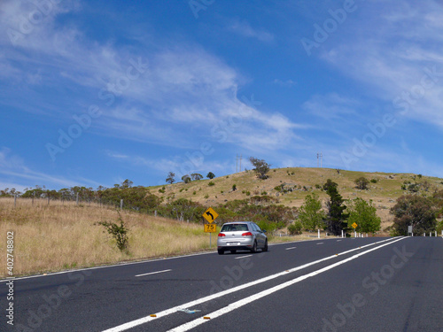 A car starts its journey on the Alpine Way near Jindabyne, Australia