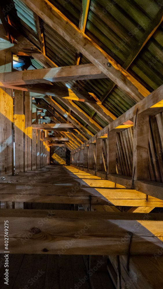 Obraz premium Ruins of Sigulda Medieval Castle, Latvia. Old Fortress Wooden Tower Interior With Window Hatches Night Shot.