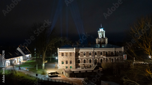 Sigulda New Castle in Latvia. Built in 1878 in Neo-gothic Style as the Living House for the Owners of the Manor, Kropotkin Family. Old Fortress Cristmas Time Night Shot. photo