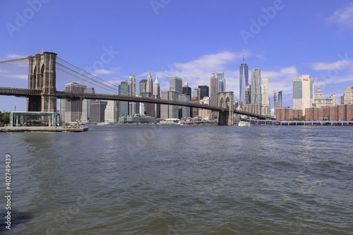 View of Manhattan and Brooklyn Bridge from the Empire Fultom Ferry Park © Migeli Barrios