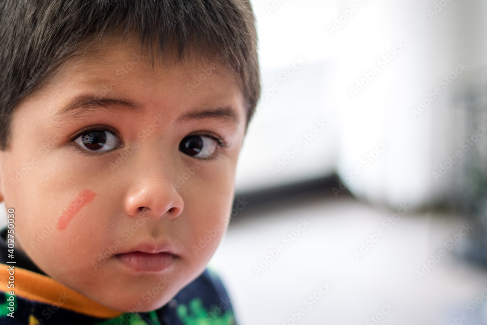 Close up child face, Head shot of happy Kid with a dirty face Close up child face, Head shot of happy Kid with a dirty face