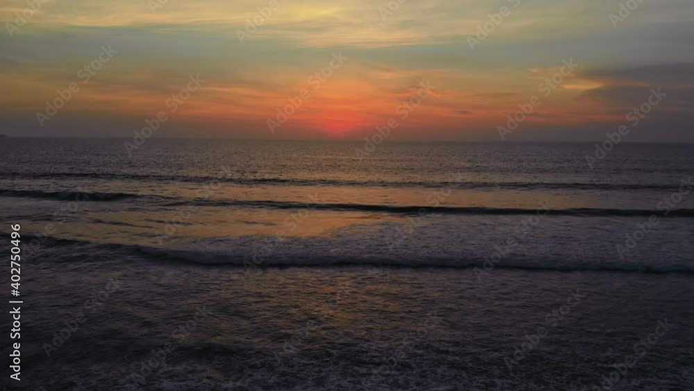 Flight at sunset overlooking the Indian Ocean in Bali Indonesia. Flight at sunset overlooking the Indian Ocean in Bali Indonesia.