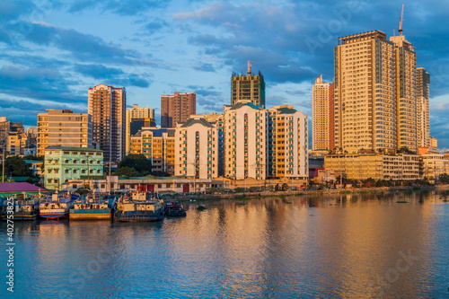 Skyline of Manila behind Pasig river  Philippines.