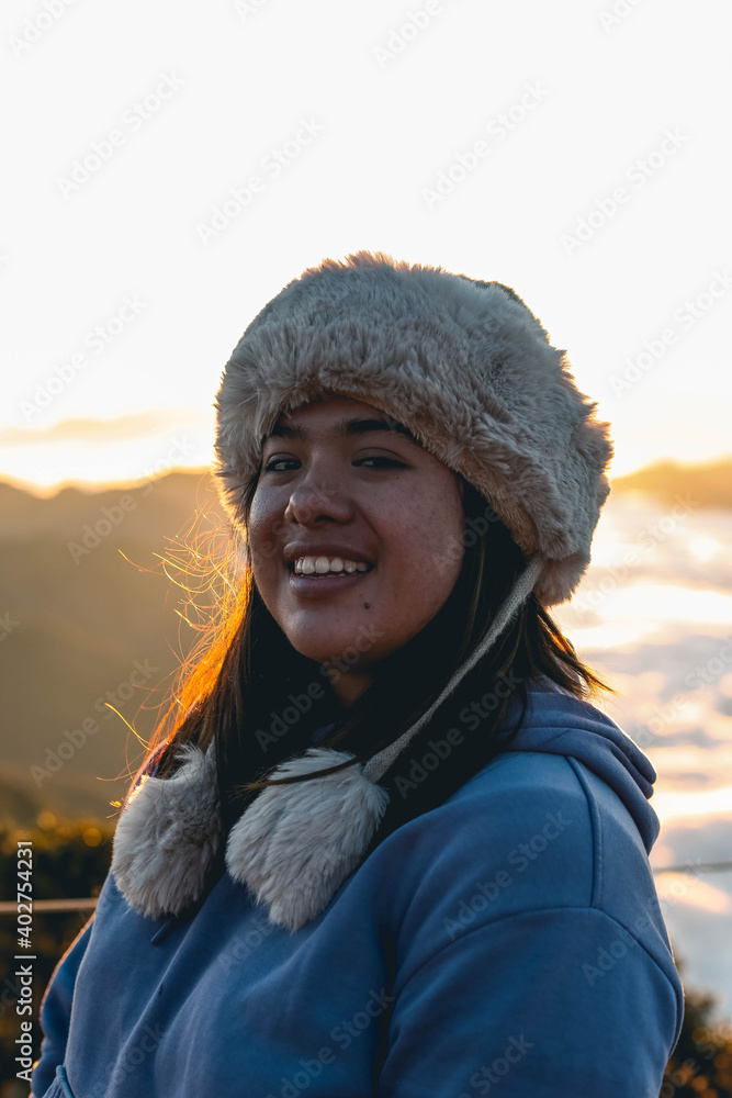 Young beautiful happy woman swinging on a swing on the beach during sunset, relaxing travel lifestyle concept, happy girl in beautiful landscape in mexico Young beautiful happy woman swinging on a swing on the beach during sunset, relaxing travel lifestyle concept, happy girl in beautiful landscape in mexico