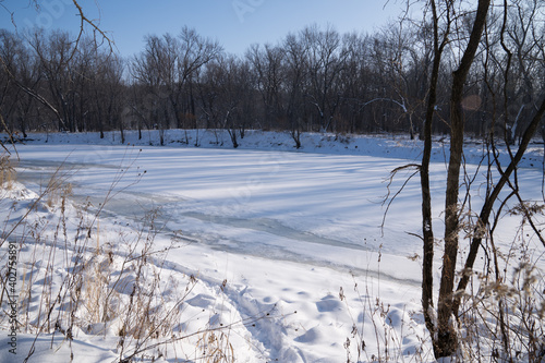 St Croix River, frozen and covered in ice, as seen from William O'Brien State Park Minnesota