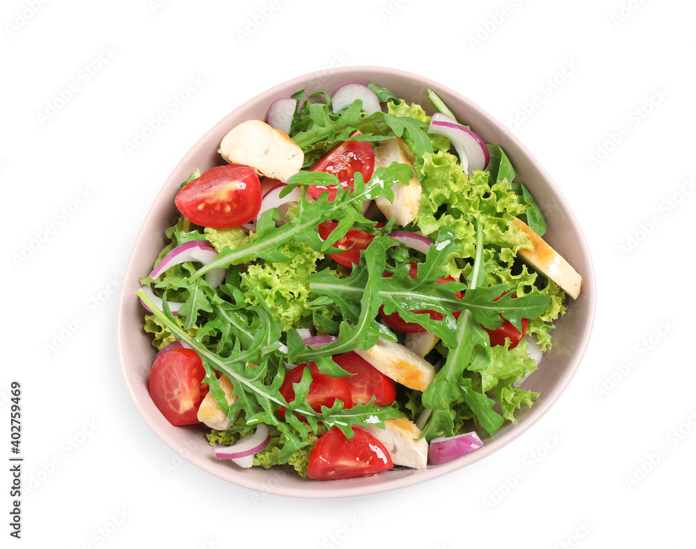 Delicious salad with chicken, arugula and tomatoes in bowl isolated on white, top view