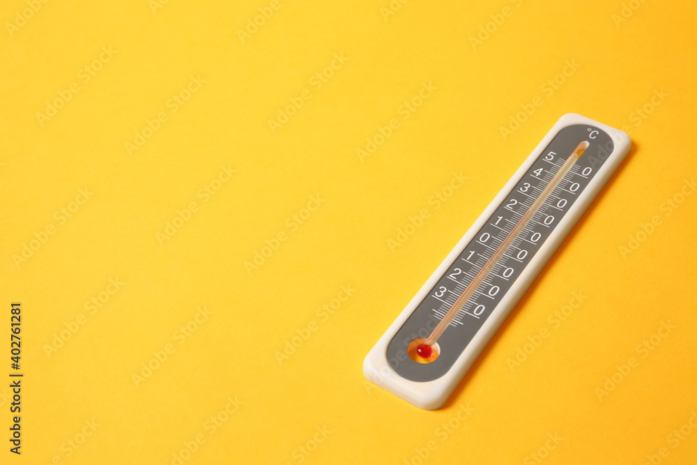 Weather thermometer on yellow background. Space for text Weather thermometer on yellow background. Space for text