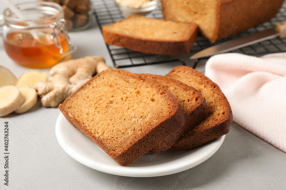 Fresh gingerbread cake slices served on light table, closeup Fresh gingerbread cake slices served on light table, closeup