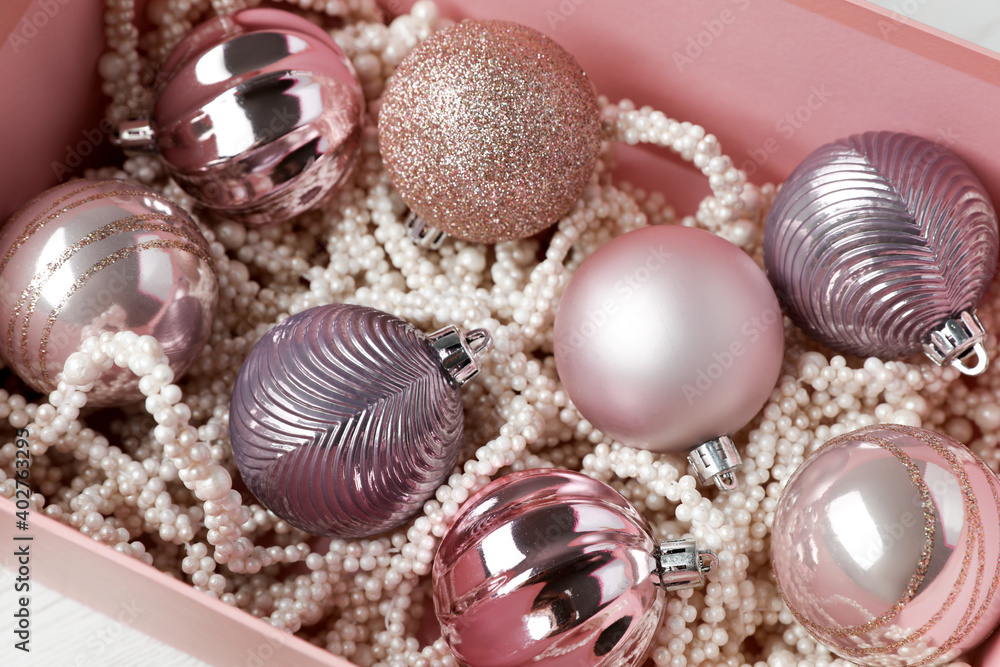 Beautiful Christmas baubles in box, closeup view Beautiful Christmas baubles in box, closeup view