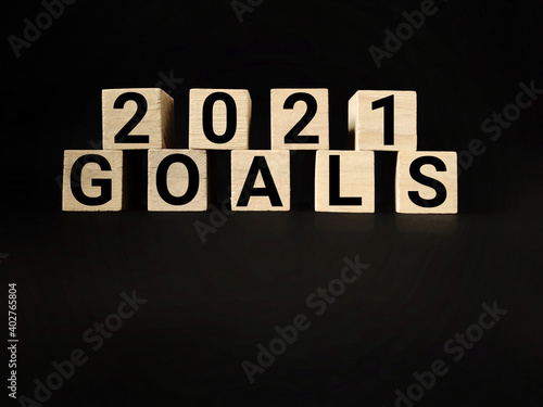 2021 GOALS text on wooden blocks with black background. Business Concept. Stock photo.