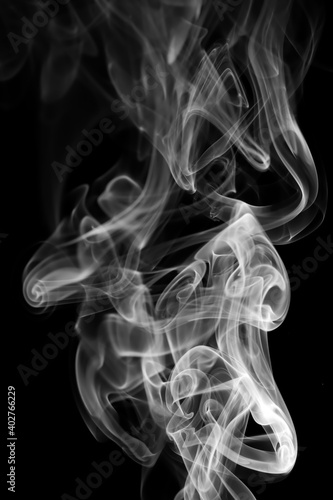 swirling movement of white smoke group, abstract line Isolated on black background