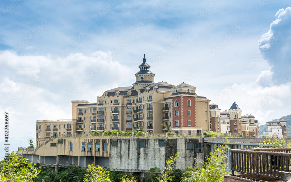 A modern castle against cloudy sky in Overseas Chinese Town (OCT) East of Shenzhen, China