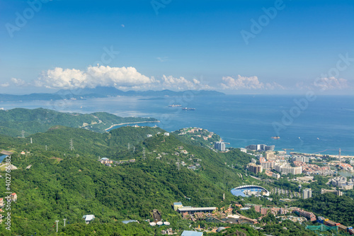 Beautiful coastline and villas in Shenzhen Bay against cloudy sky , View from Overseas Chinese Town East (OCT East ) in Shenzhen, Guangdong, China.