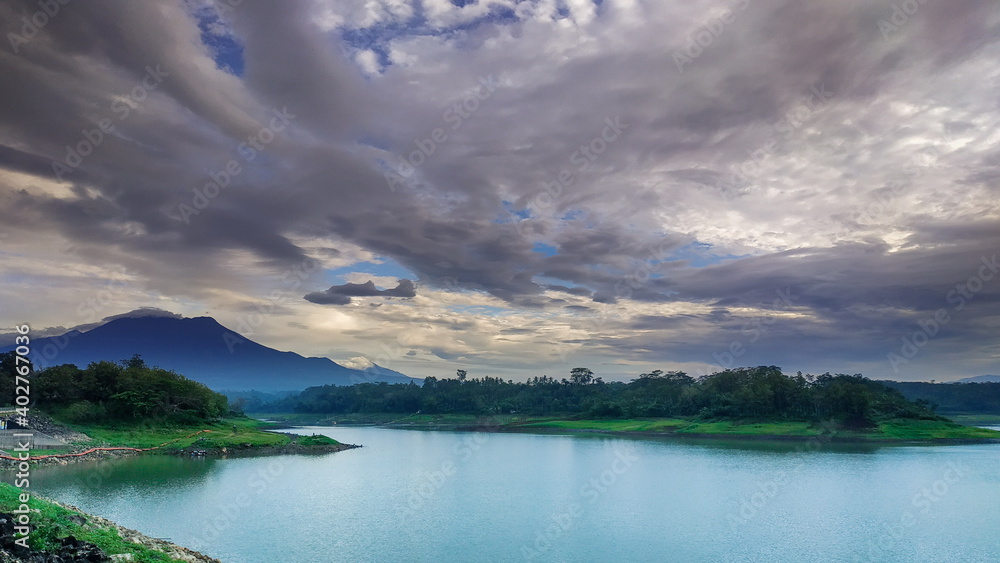 beautiful karangkates lakes and lahor reservoirs and black and white clouds dotting the sky