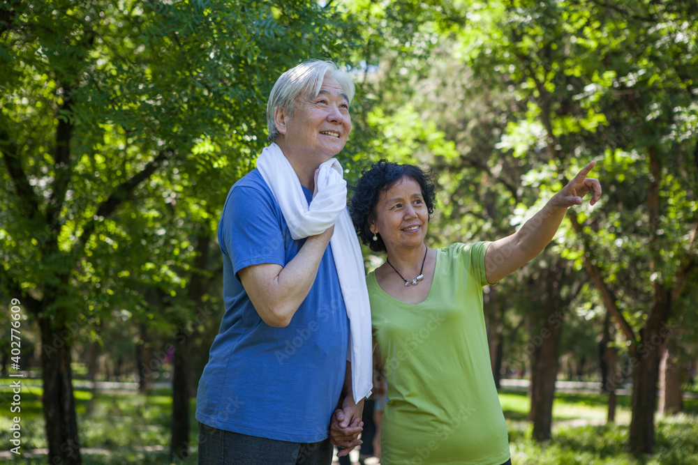 Two old people exercising in the park Two old people exercising in the park