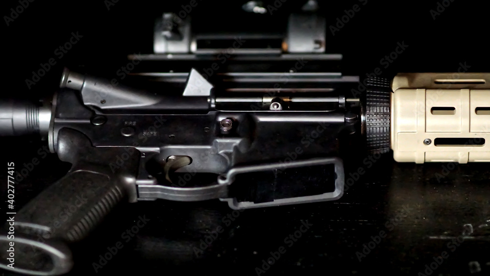 Armorer gunsmith repairing and maintaining an AR15 Rifle. Armorer gunsmith repairing and maintaining an AR15 Rifle.