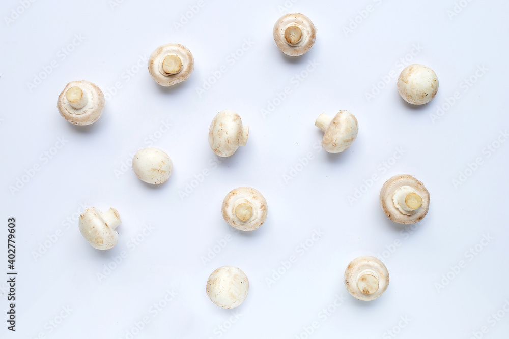 Champignon mushrooms on white background. Top view Champignon mushrooms on white background. Top view