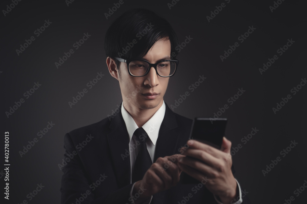 Businessman scans face by smart phone using facial recognition system. Businessman scans face by smart phone using facial recognition system.