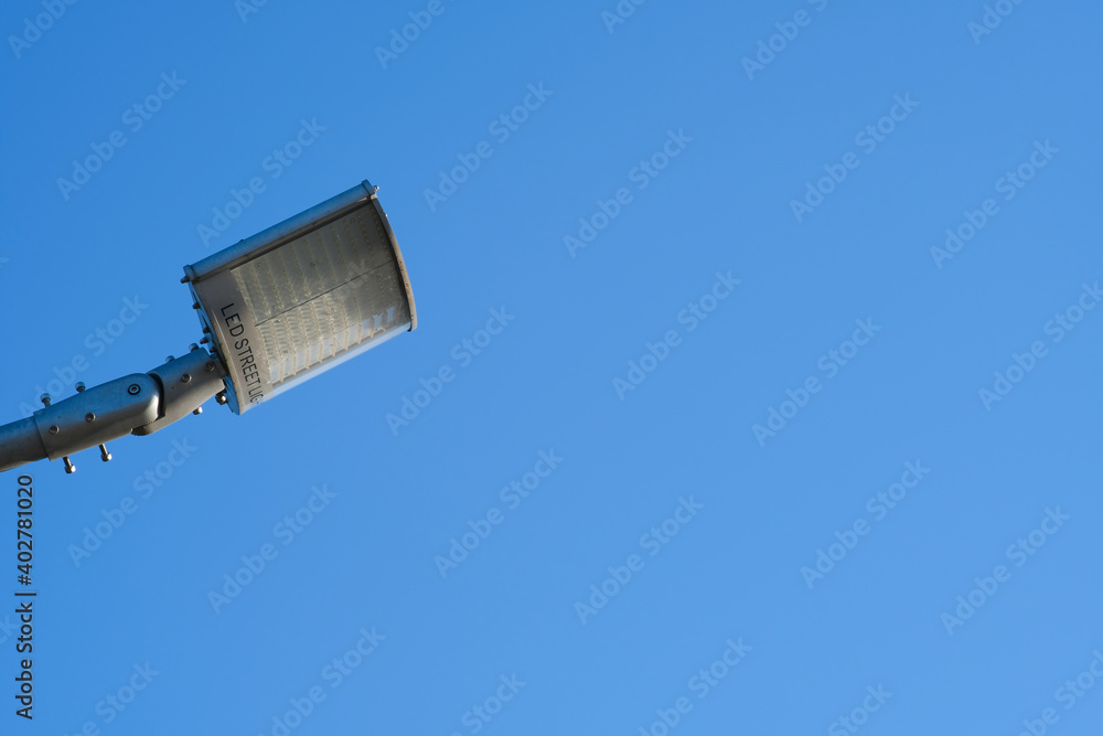 The street lamp on the side of the picture Has a dark blue sky background The street lamp on the side of the picture Has a dark blue sky background