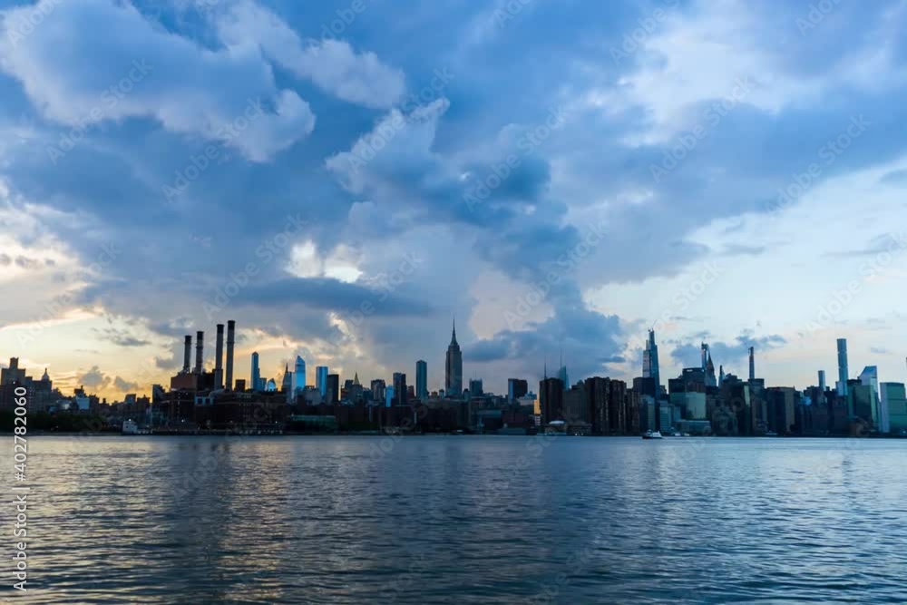 NYC- Empire State Building time-lapse with dramatic clouds NYC- Empire State Building time-lapse with dramatic clouds