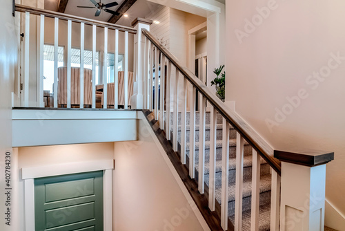 Interior stairway that goes down to the basement or garage from the main floor