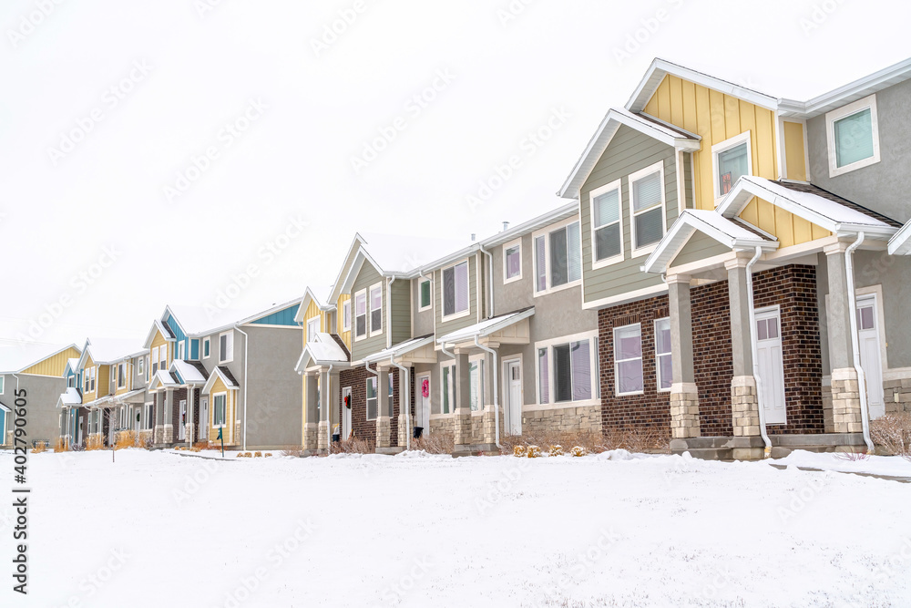 Stunning winter landscape of apartments in a snowy neighborhood in the suburbs Stunning winter landscape of apartments in a snowy neighborhood in the suburbs