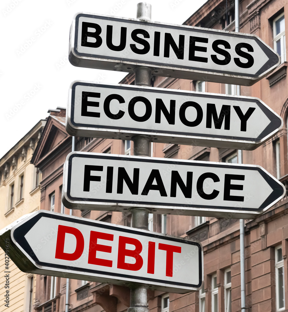 The road indicator on the arrows of which is written - business, economics, finance and DEBIT The road indicator on the arrows of which is written - business, economics, finance and DEBIT
