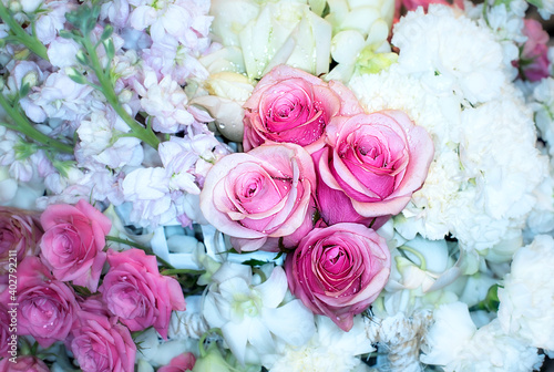 Fototapeta Naklejka Na Ścianę i Meble -  Close-up of a mixed bouquet of roses,summer flowers background.