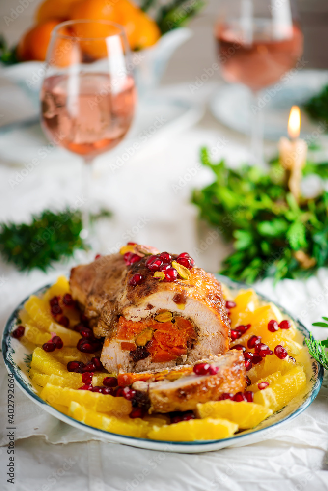 festive turkey roll with fruit on a festively laid table..style rustic. festive turkey roll with fruit on a festively laid table..style rustic.