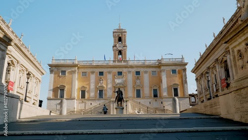 Walking up the stairs that lead to the Capitoline Hill and museums located in the historical downtown of Rome, Italy photo