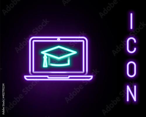 Glowing neon line Graduation cap on screen laptop icon isolated on black background. Online learning or e-learning concept. Colorful outline concept. Vector.