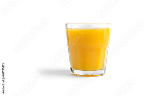 Orange juice in glass on a white background. . High quality photo