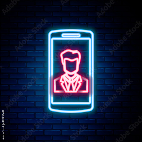 Glowing neon line Smartphone with contact on screen icon isolated on brick wall background. Incoming call. Human on phone screen. Call contact. Colorful outline concept. Vector.