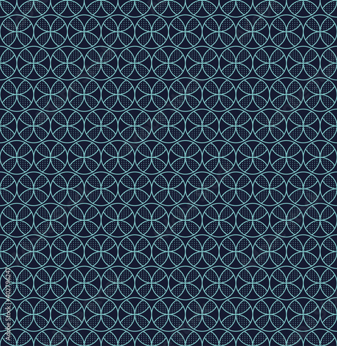 Seamless pattern blue circles geometric flower on dark background