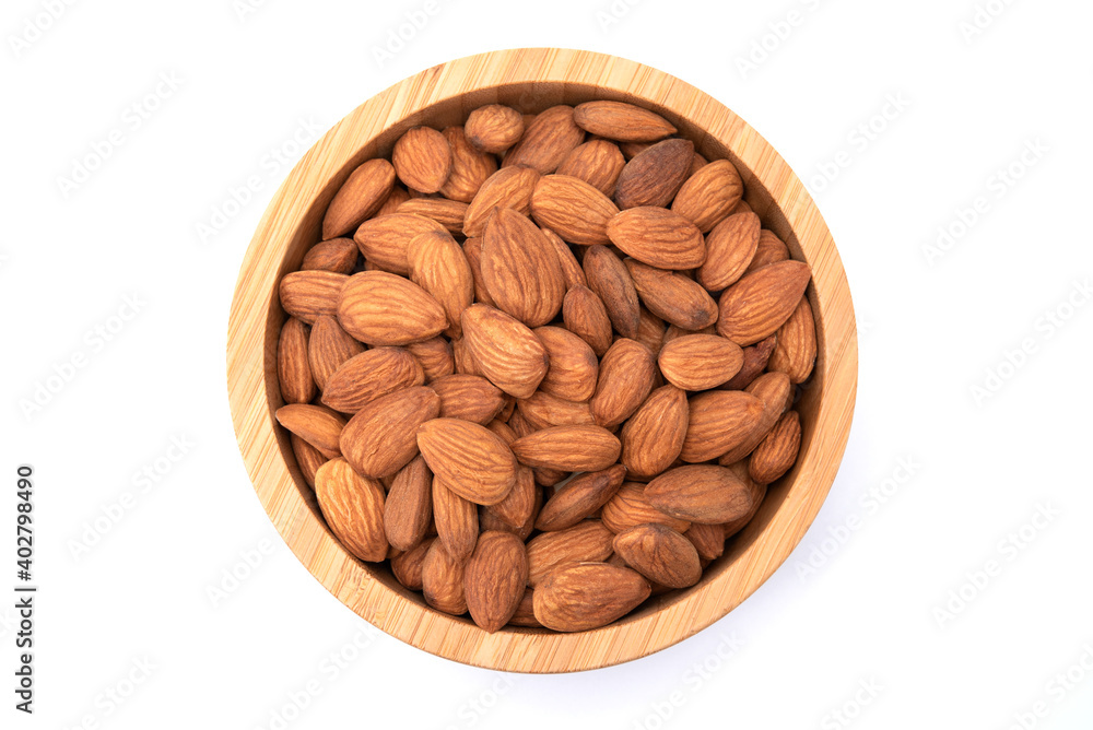 Top view of almonds in wooden bowl isolated on white background Top view of almonds in wooden bowl isolated on white background