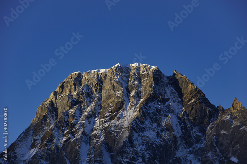 Pharilapcha Peak with beautiful golden sunrise light. Photographed from Gokyo Ri peak. photo