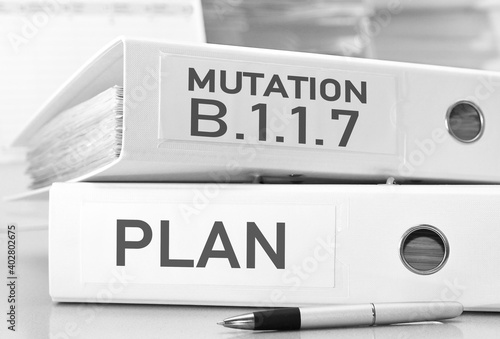 Mutation B.1.1.7 and the strategy plans in folders photo