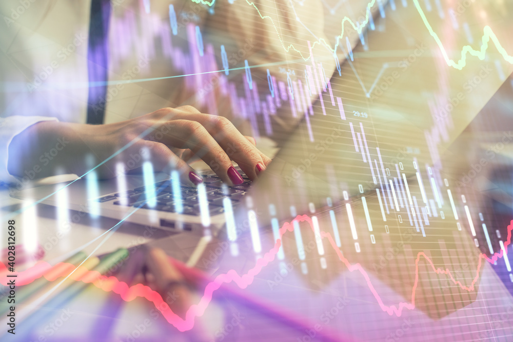 Double exposure of woman hands typing on computer and financial graph hologram drawing. Stock market analysis concept. Double exposure of woman hands typing on computer and financial graph hologram drawing. Stock market analysis concept.