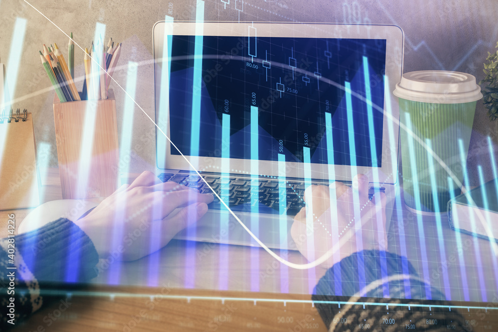 Double exposure of woman hands typing on computer and forex chart hologram drawing. Stock market invest concept. Double exposure of woman hands typing on computer and forex chart hologram drawing. Stock market invest concept.
