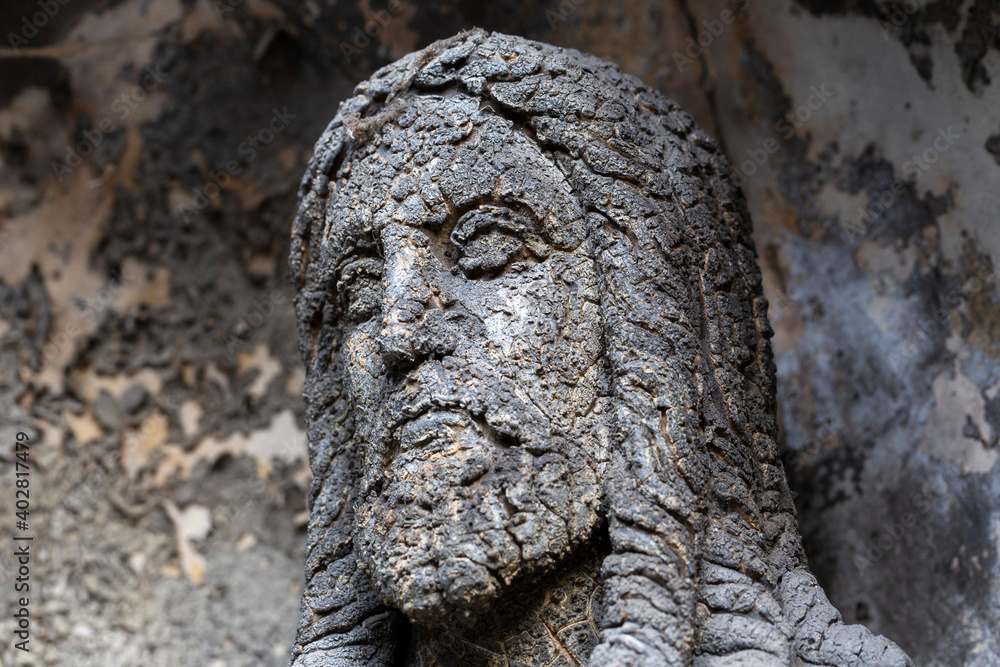 Historic Jesus on the winter mystery old Prague Cemetery, Czech Republic