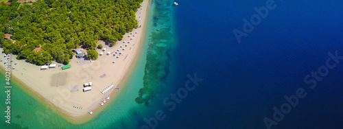 Aerial drone ultra wide photo from paradise organised bay and sandy beach of Gregolimano, North Evia island, Greece