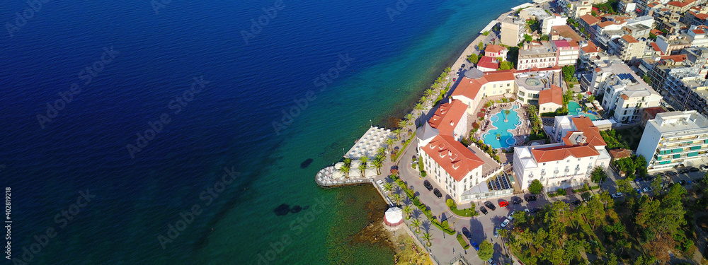 Aerial drone ultra wide photo of famous seaside village well known for thermal springs of Aidipsos, North Evia island, Greece