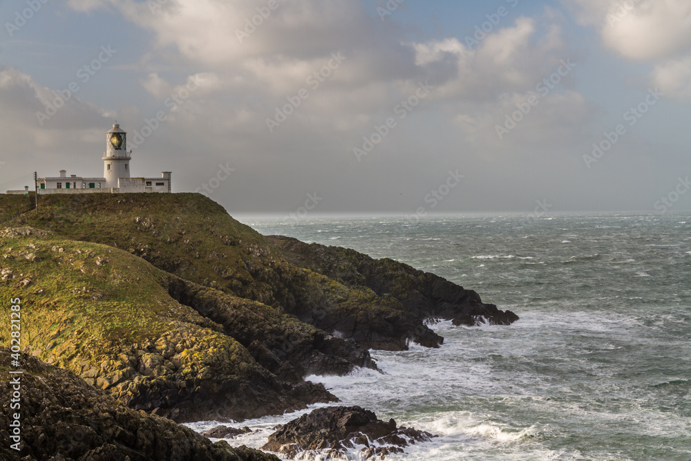 Strumble Head Lighthouse in stormy weather