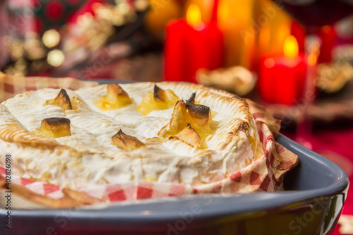 French camembert baked in the oven with garlic