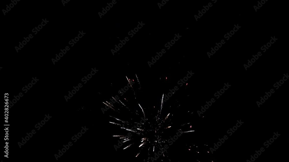 Festive background.Fireworks exploding brightly against the dark sky