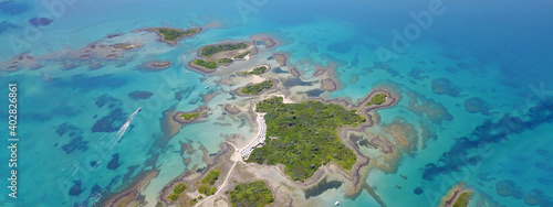 Aerial drone ultra wide panoramic photo of exotic paradise island complex forming an atoll archipelago 